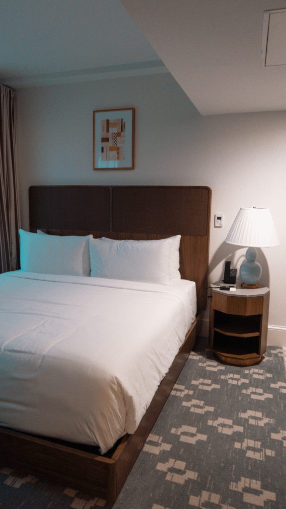 Hotel Granada Review by What Savvy Said Blogger Savannah Cyree - in photo: bed and bedside lamp