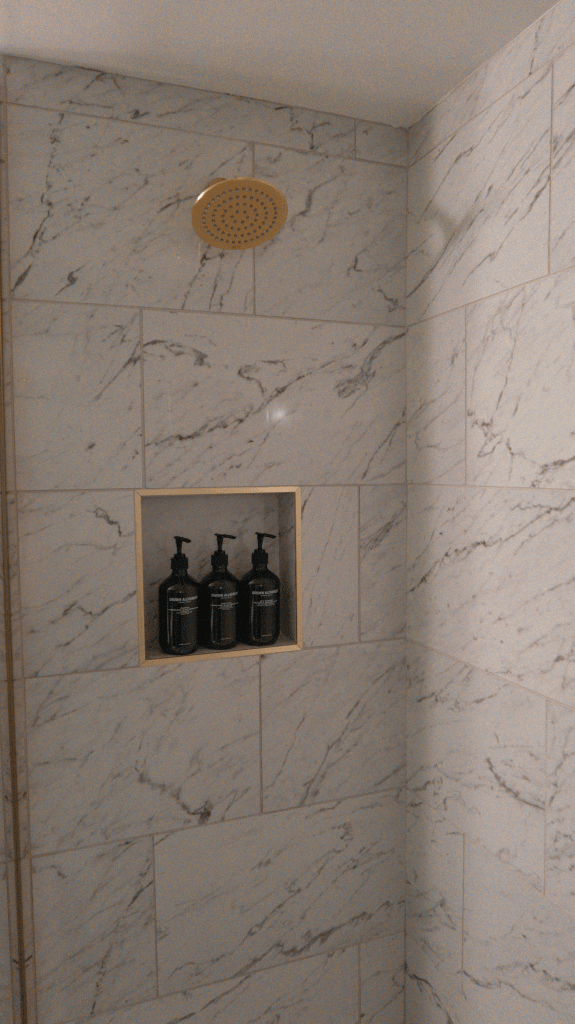 Hotel Granada Review by What Savvy Said Blogger Savannah Cyree - in photo: shower and bathroom essentials