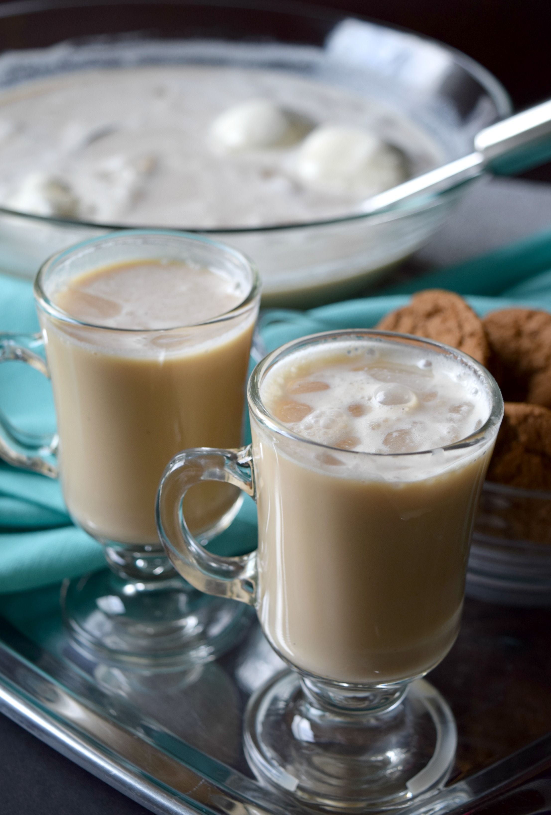 With coffee, creamer and ice cream this Easy Coffee Punch is just like a decadent iced coffee drink! Serve at your next party, your guests will love it.