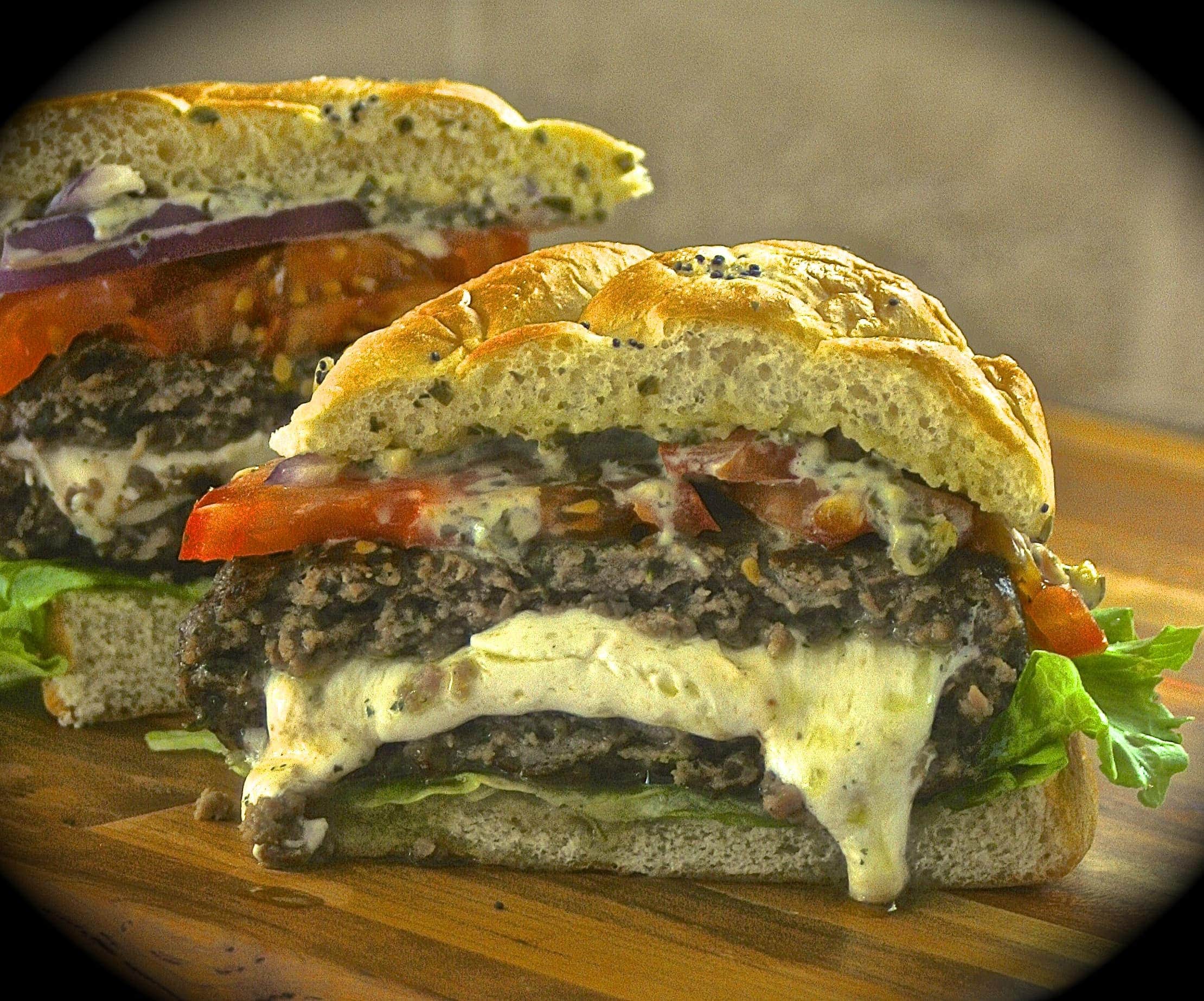 Fresh MozzarellaStuffed Pesto Burgers with PestoMayo, Red Onion