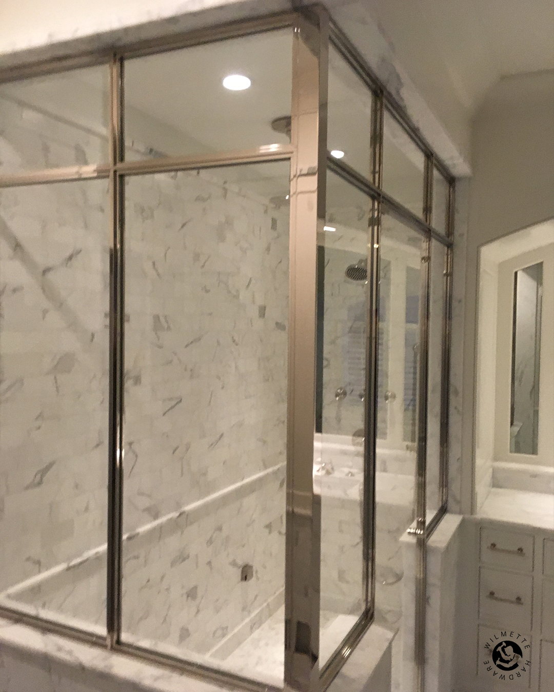 Custom polished nickel shower enclosure. WilmetteFeed
