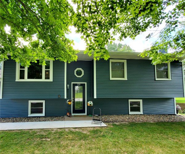 Blue Siding Wilson Construction