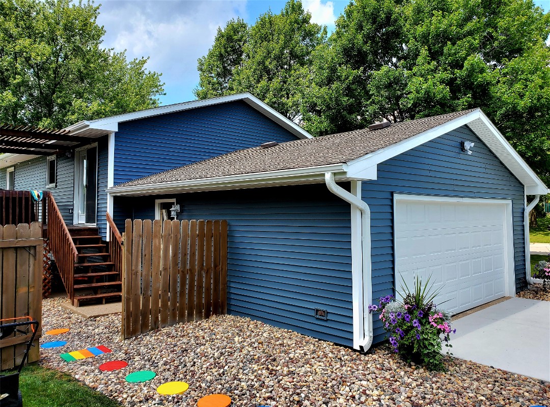 Blue Siding Wilson Construction