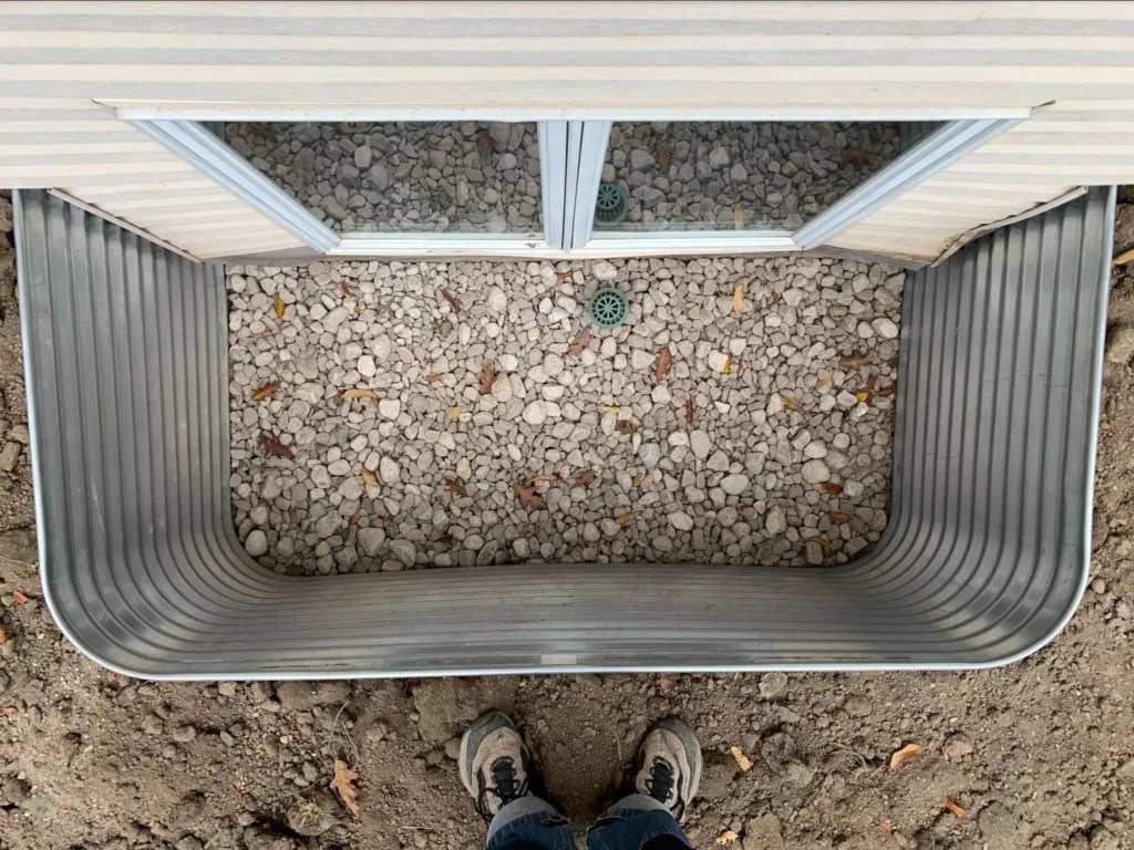 Is Your Window Well Filling With Water? Window Well Experts