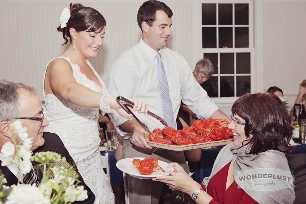 Wedding dinner of lobster and sail cloth lobster bibs With Brio