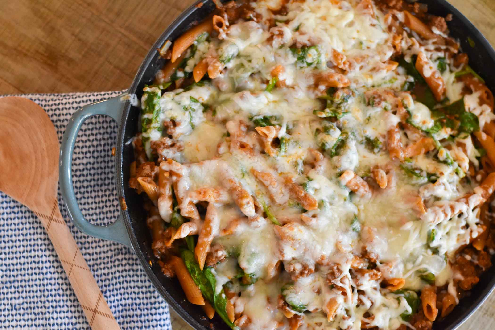 One Pot Pasta with Tomato, Spinach, and Mozzarella With Two Spoons