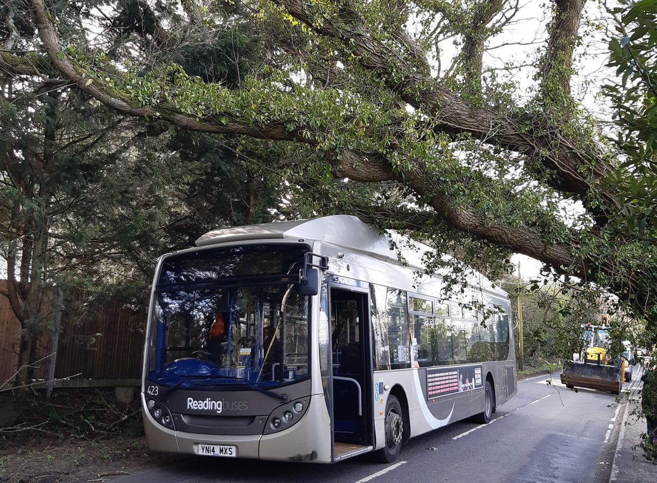 Barkham Ride closed after bus stuck under fallen tree Wokingham.Today