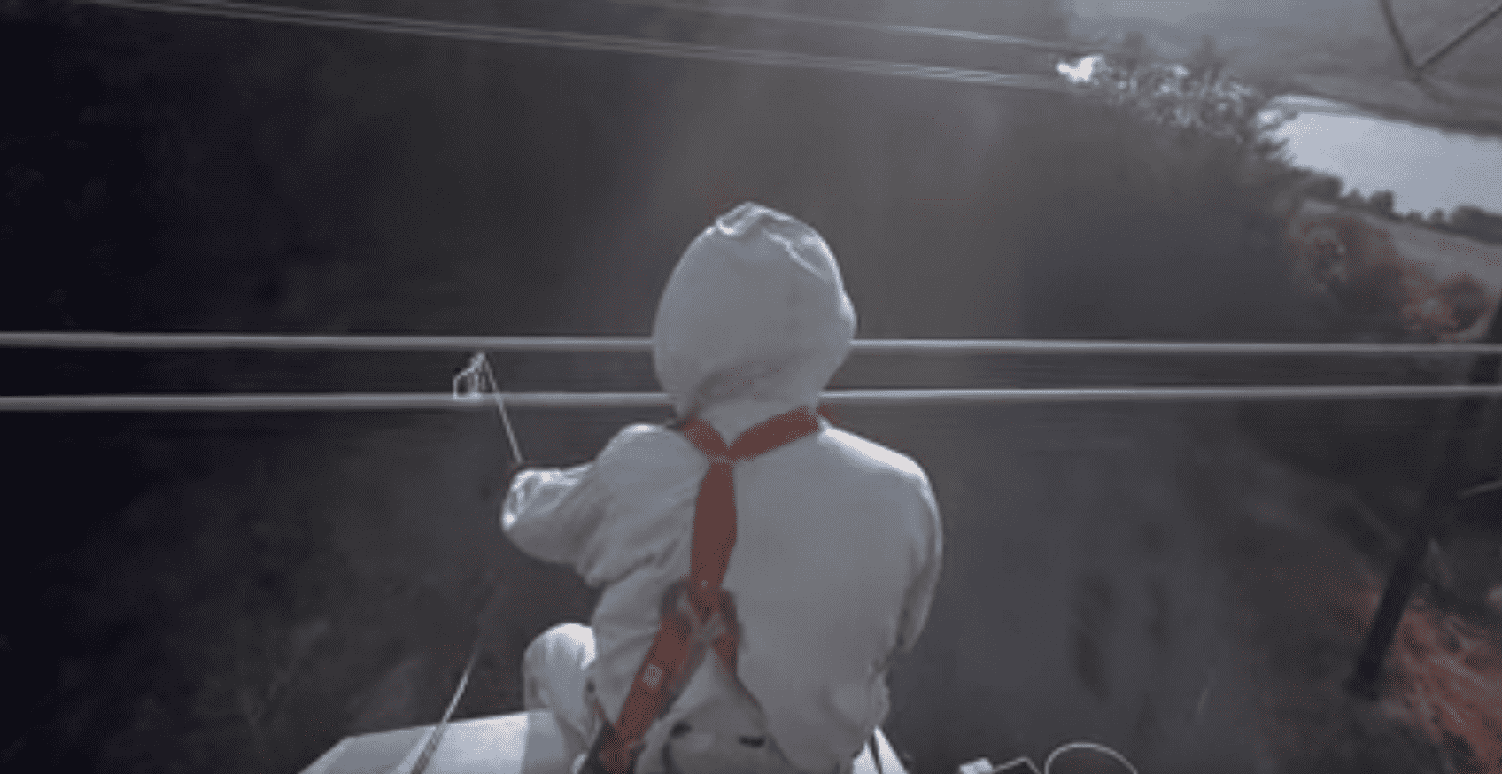 Inspecting Power Lines On A Flying Helicopter Might Be The