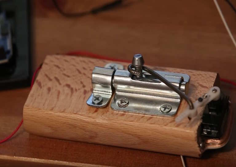 Guy Creates A Door Lock That Automatically Locks Itself When