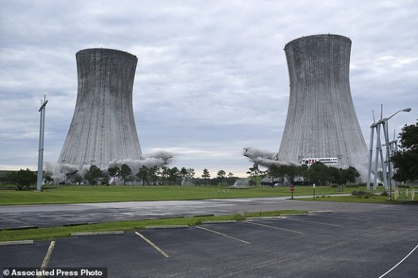 Watch These Two Huge Cooling Towers Turn To Dust With Controlled Demolition