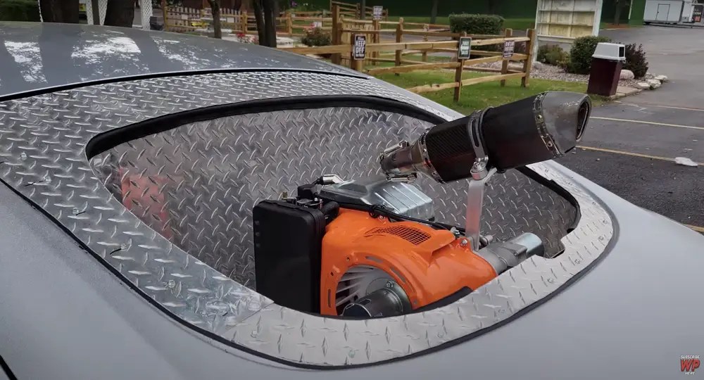 YouTuber Puts Gas Generator Inside Tesla To Avoid Having To