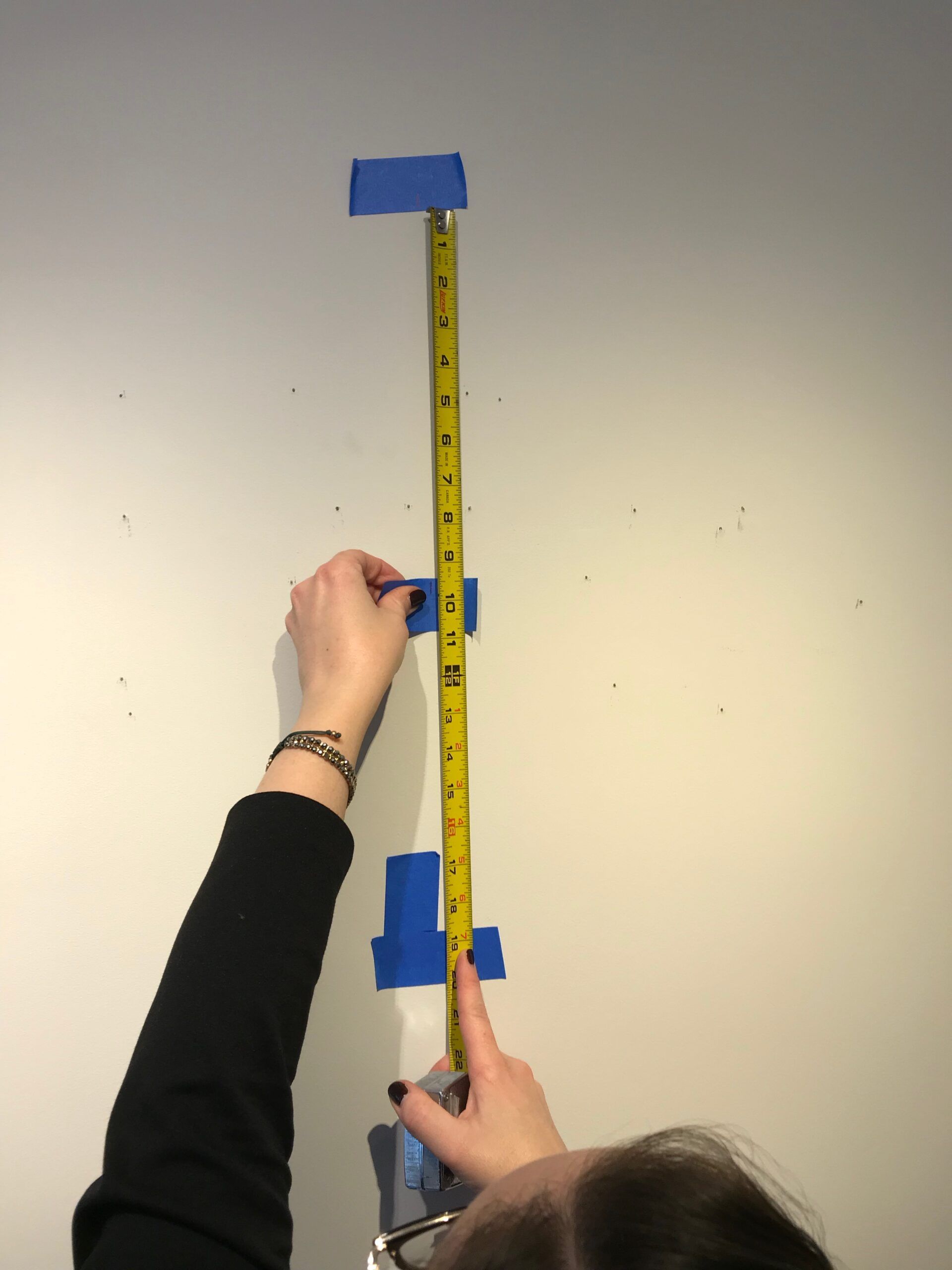 How to Hang A Painting Like A Pro Woodlands Gallery