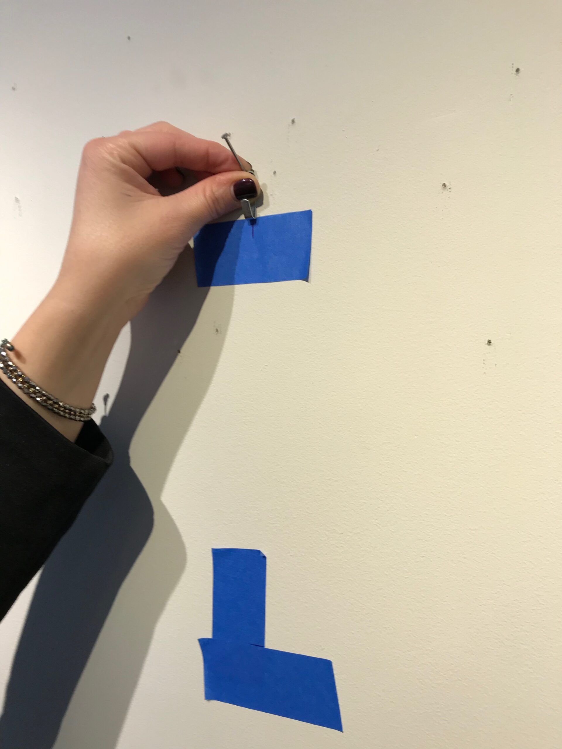 How to Hang A Painting Like A Pro Woodlands Gallery