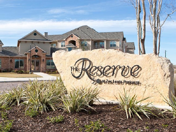 The Reserve 8602 NE Zac Lentz Parkway Woolson Real Estate, Inc.