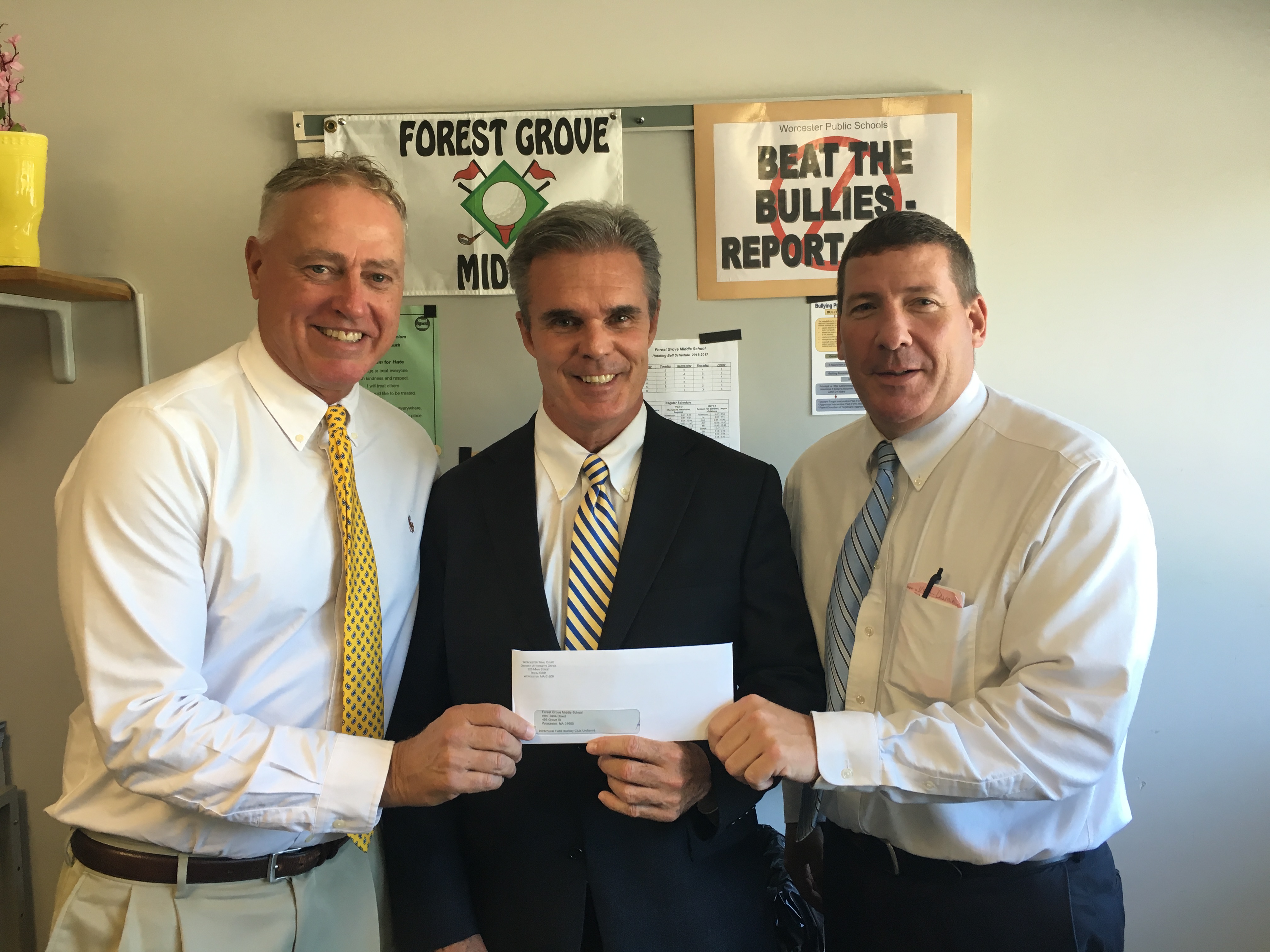 Presented a check to Forest Grove Middle School for field hockey