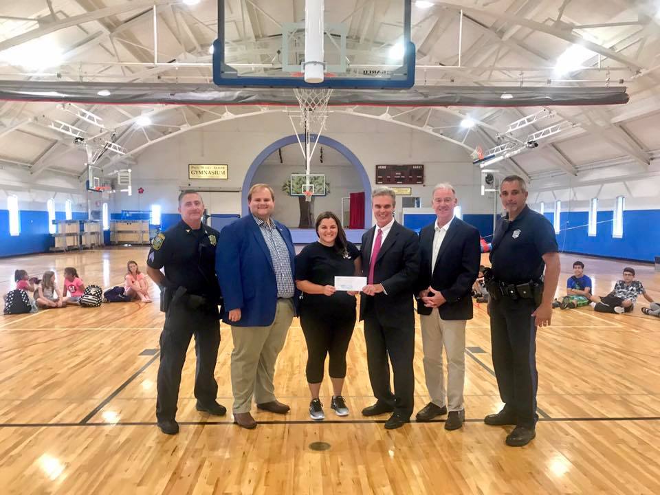 Milford Youth Center check presentation The Office of the Worcester