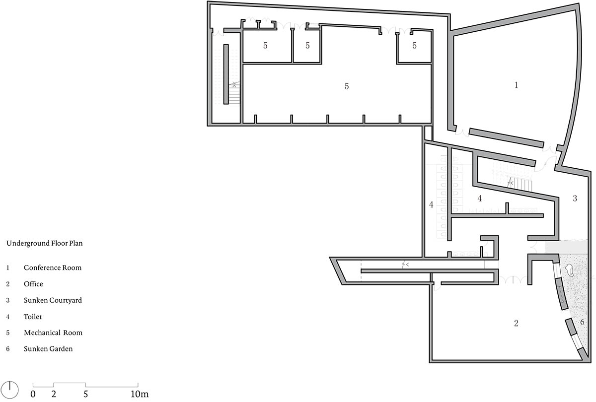 Concrete hyperboloid roofs cover masonry stone art center with a