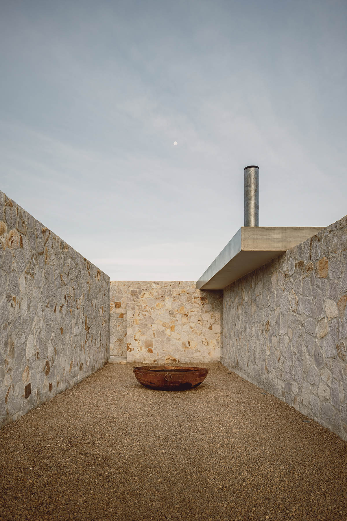 Mexican Rural House By HW Studio Is Defined By A Cross Of Stone Walls