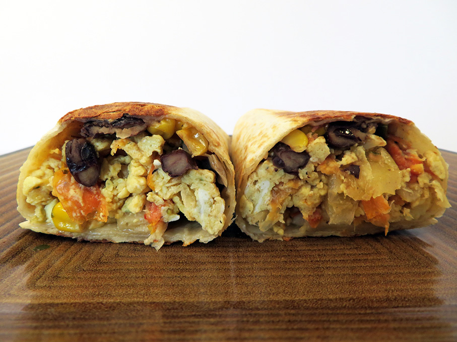 Scrambled eggs, black beans, corn and cheese burrito — A World of
