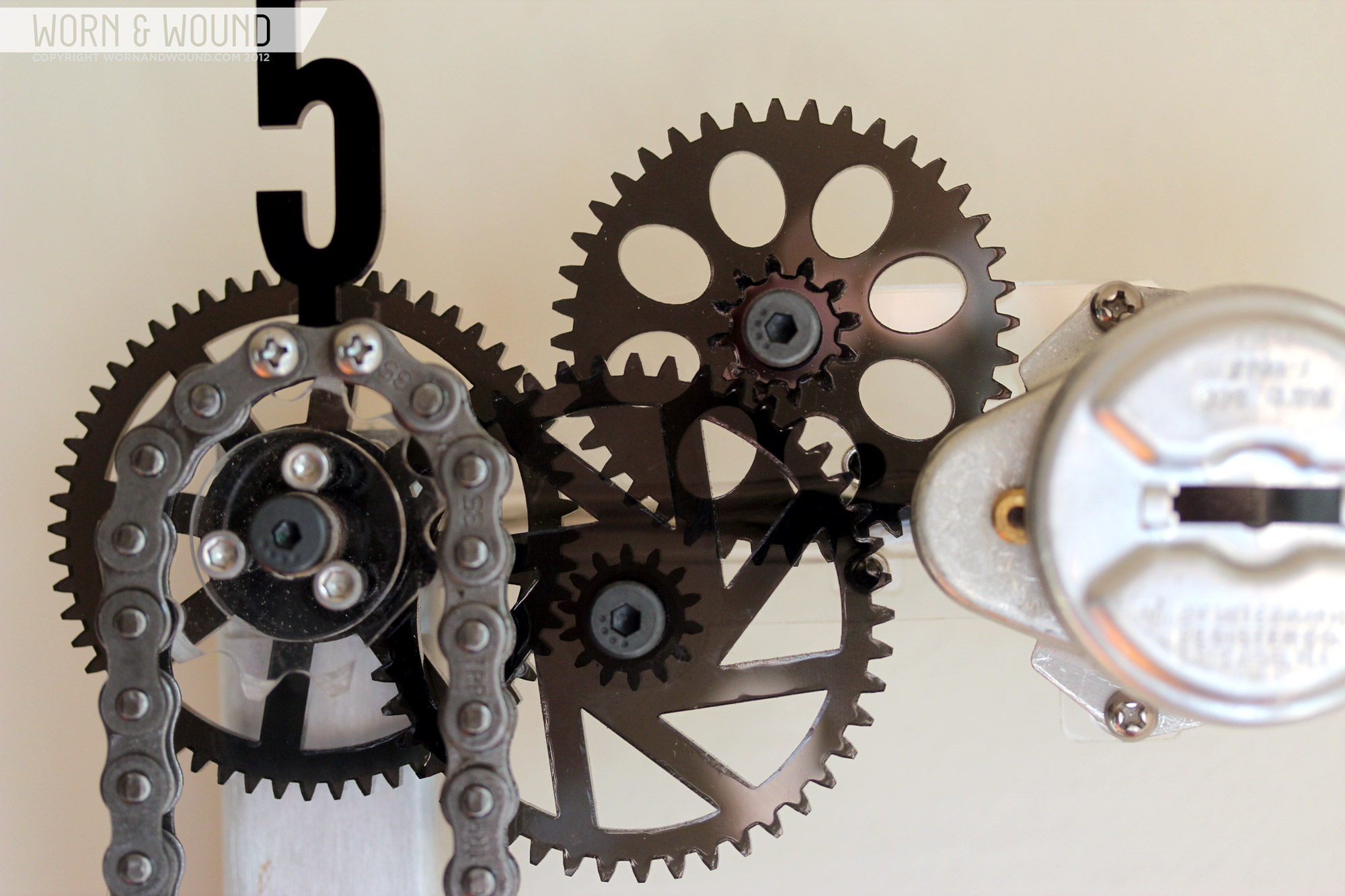 Chain Clocks A Wall Mounted Mechanism for Time Telling