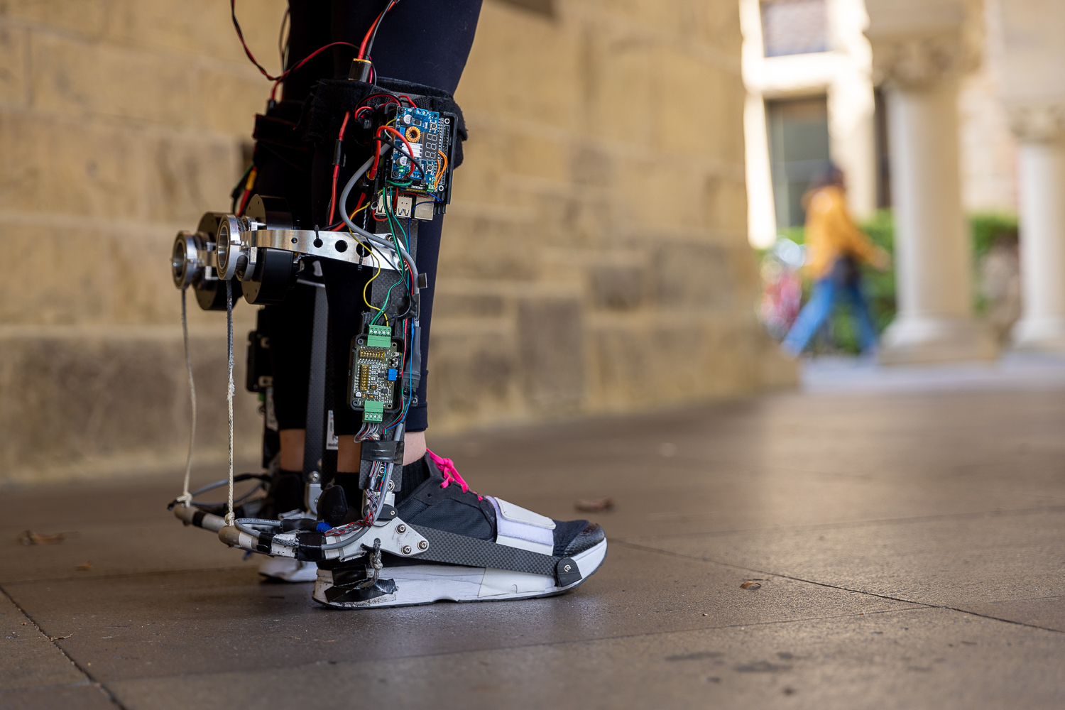 A robotic exoskeleton adapts to wearers to help them walk faster MIT