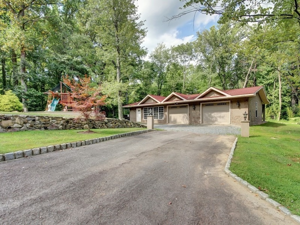 UPDATE Incarcerated Teresa Giudice Drops Price on NJ Mansion