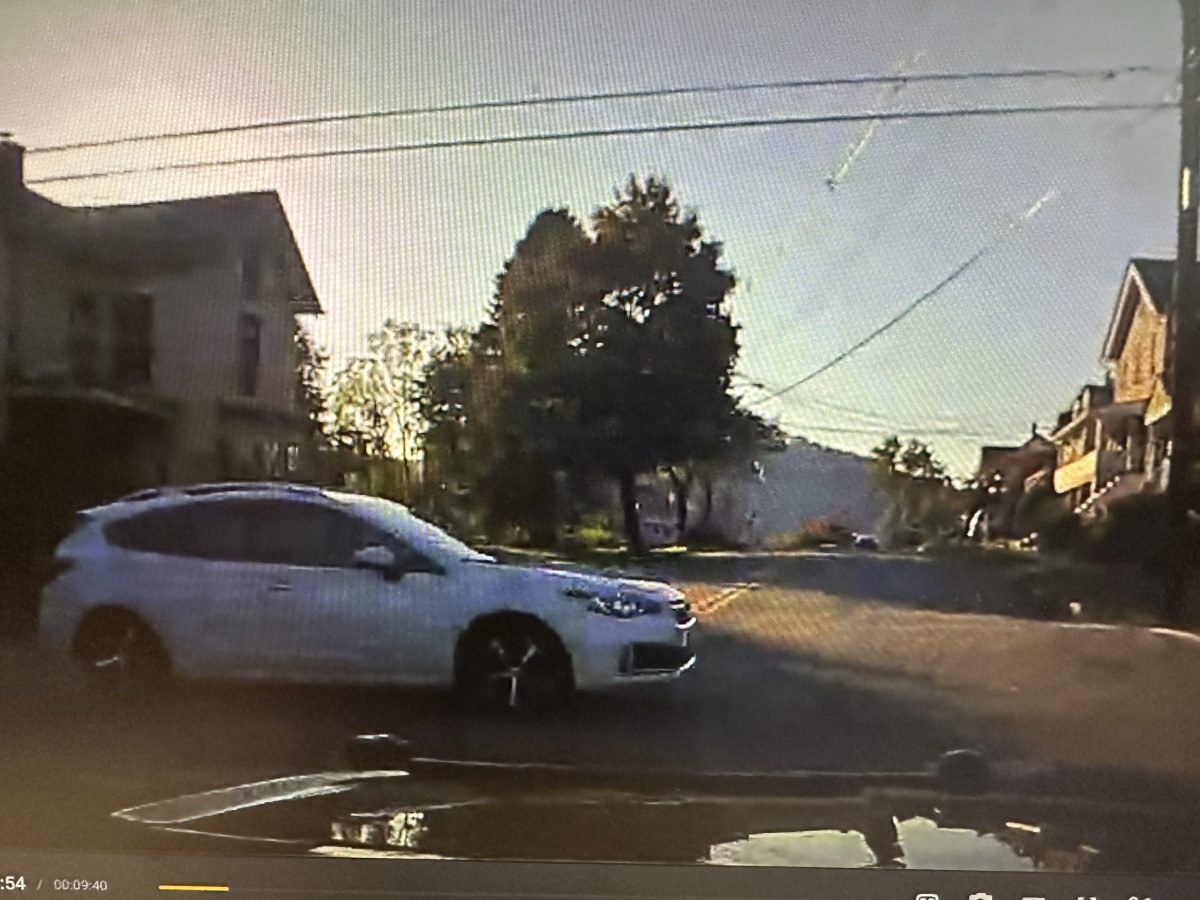 Dashcam video captures car run stop sign, nearly causing crash with