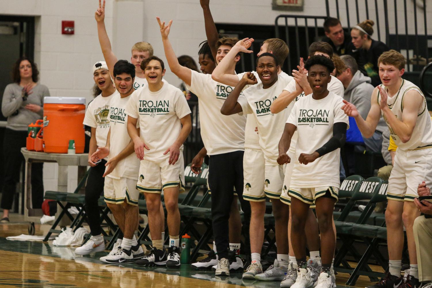 West Side Story Basketball teams sweep LinnMar