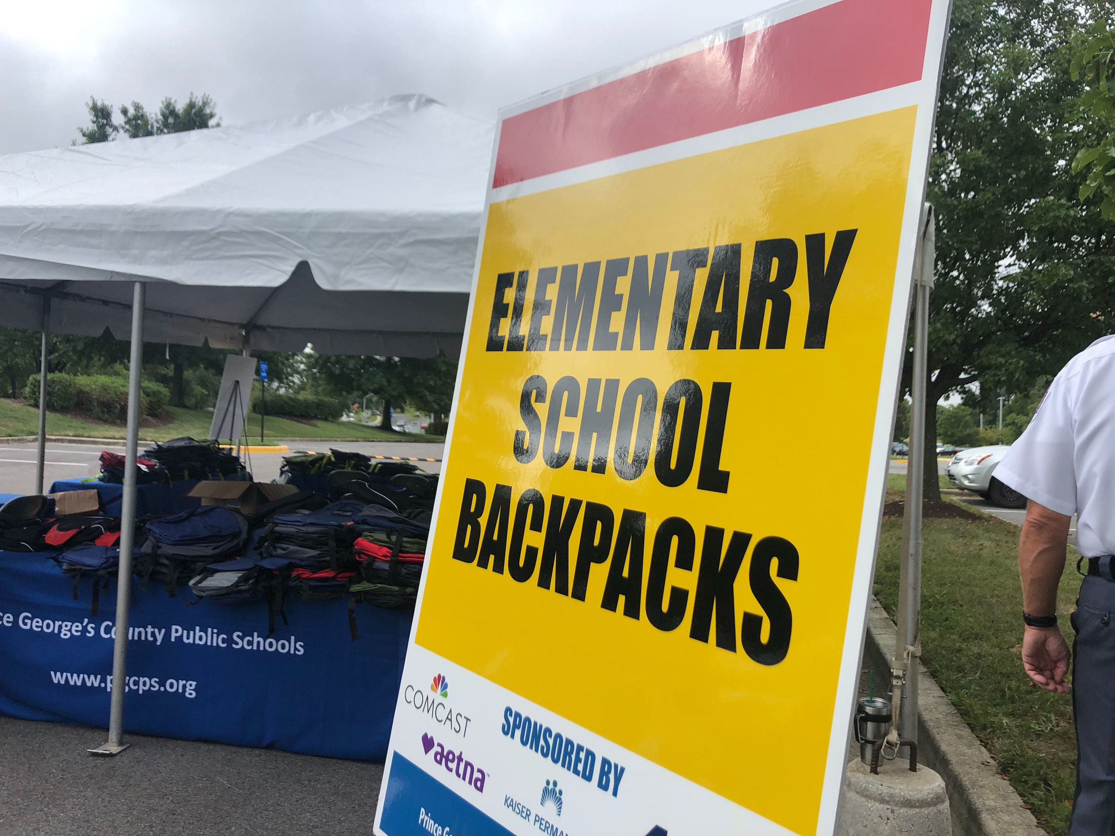 Hundreds show up for backpack drivethru in Prince Co. WTOP News