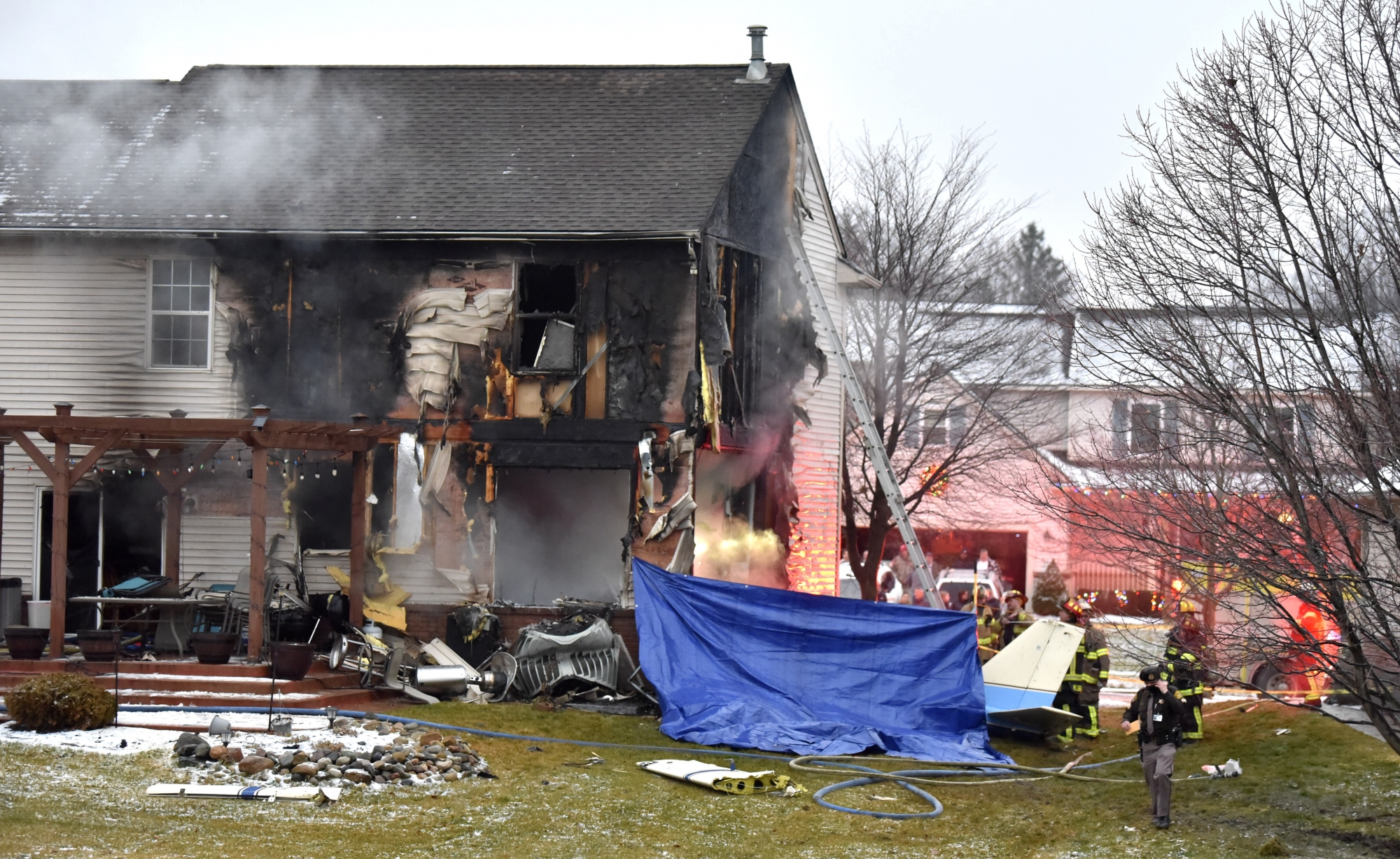 Businessman and family die when plane hits Michigan house WTOP News