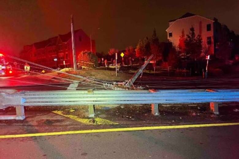 Car crashes into utility pole and house, causing thousands to lose