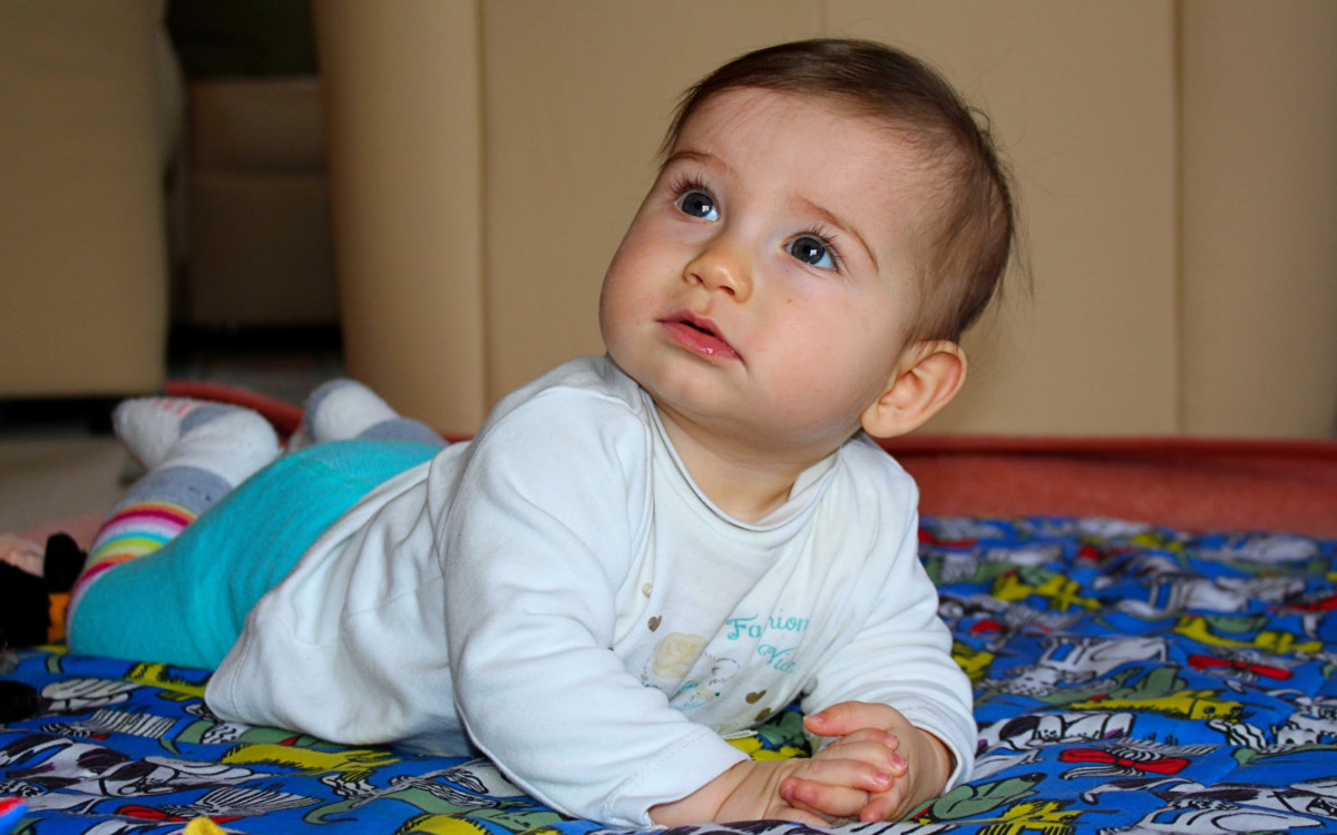 Baby curious about exhausted couple that remove her from creche every