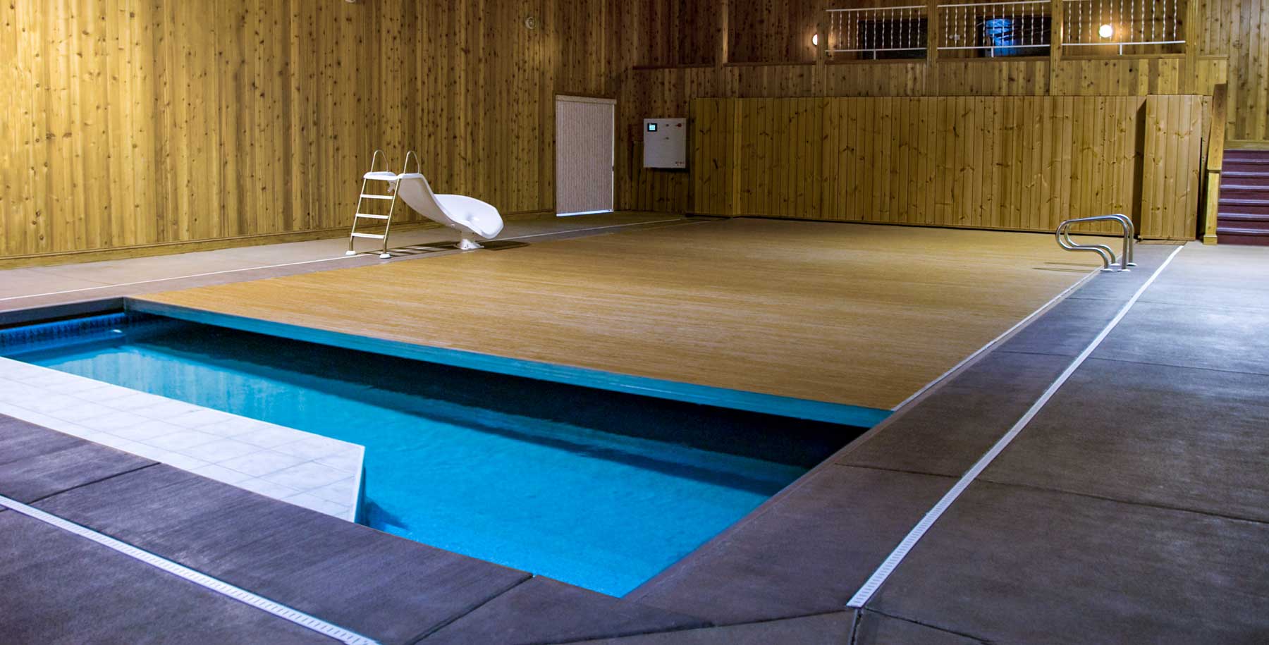 WutPool® Retractable Pool Covers & LoadBearing Flooring Systems