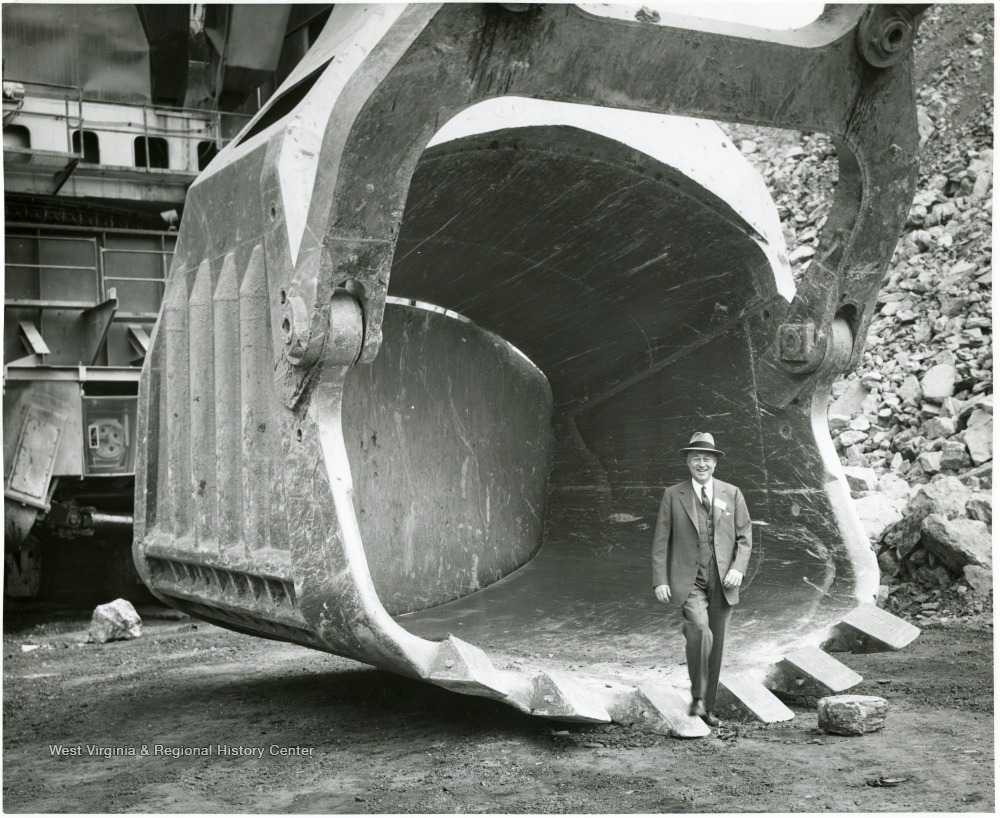 Visitor Standing In The Scoop of the Mountaineer Coal Shovel West