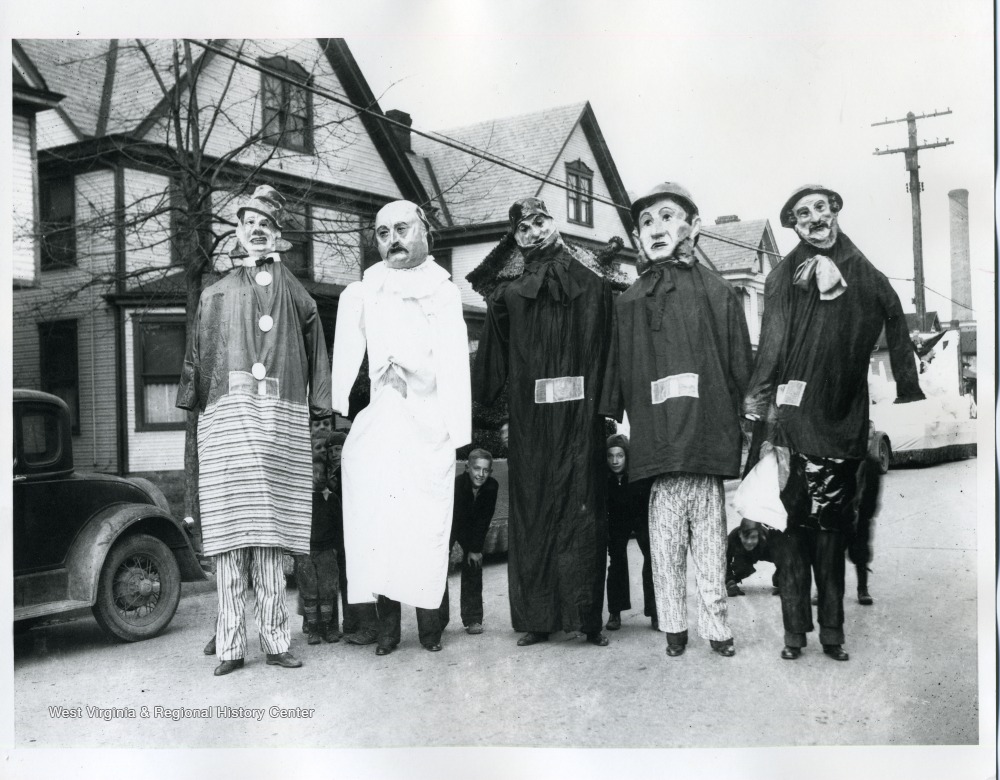 Parade Participants in Tall Costumes, W. Va. West