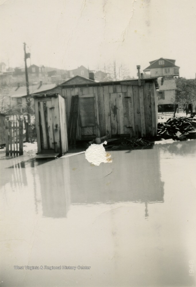 Flood Waters Surrounding a Small Building in Mercer County, W. Va