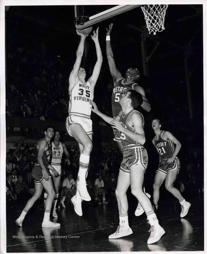WVU Basketball Player Dave Reaser (23) Lays one in vs. Detroit West