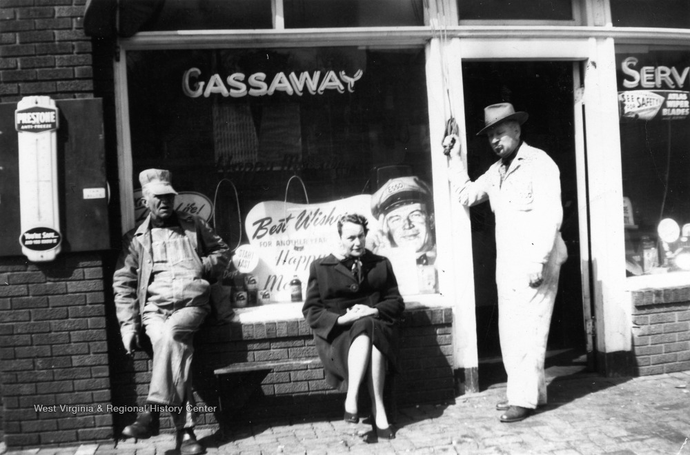 Homer Bragg, Bea and Grant Crockett in Front of Esso Service Station