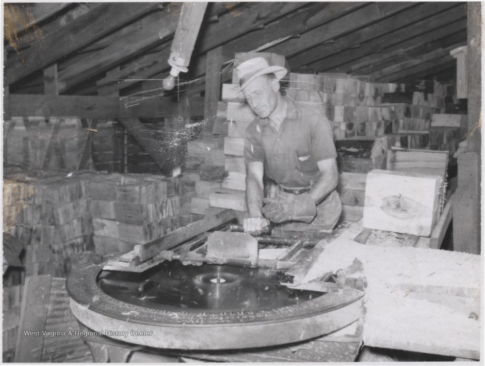 Man Working Sawmill Machinery at Kirby Lumber Company, Layland, W. Va