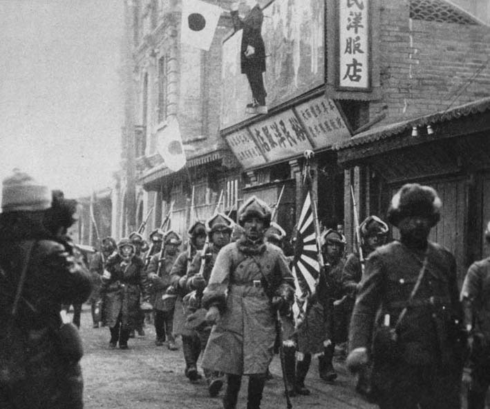 [Photo] Japanese troops marching into an identified town, northeastern