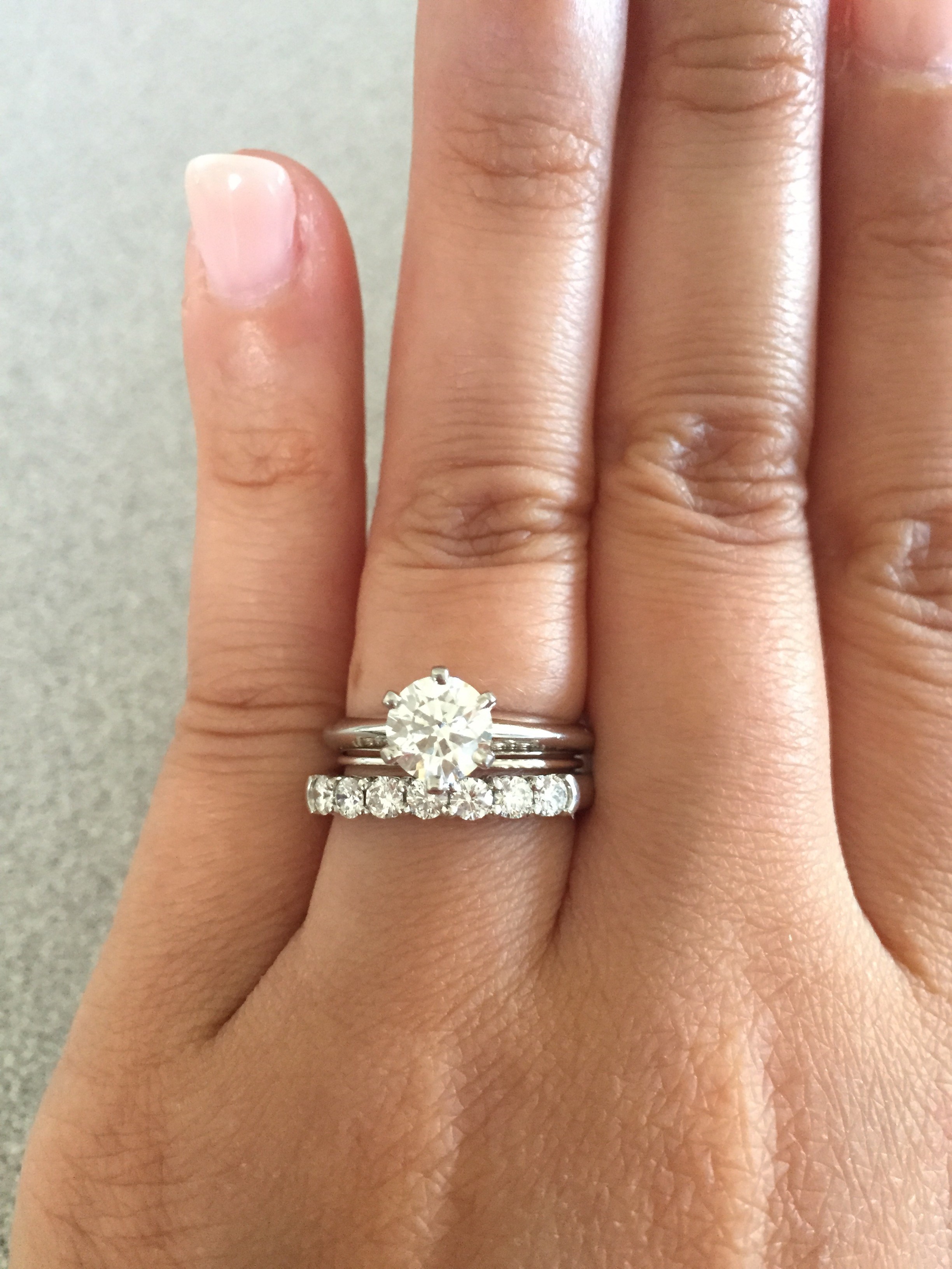 Should I purchase a preowned Tiffany setting solitaire, or buy the