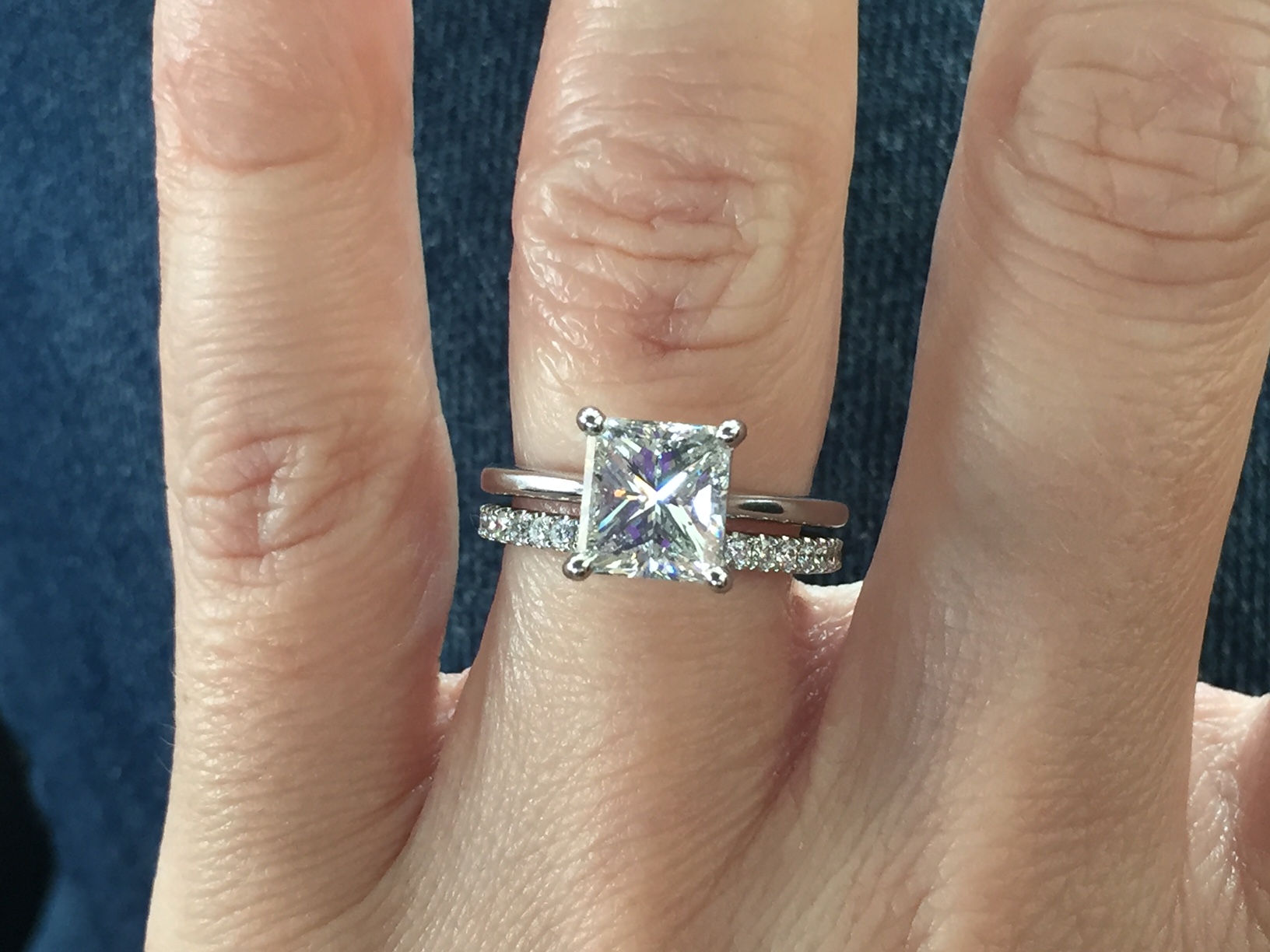 Show me your solitaire rings with an eternity diamond wedding band