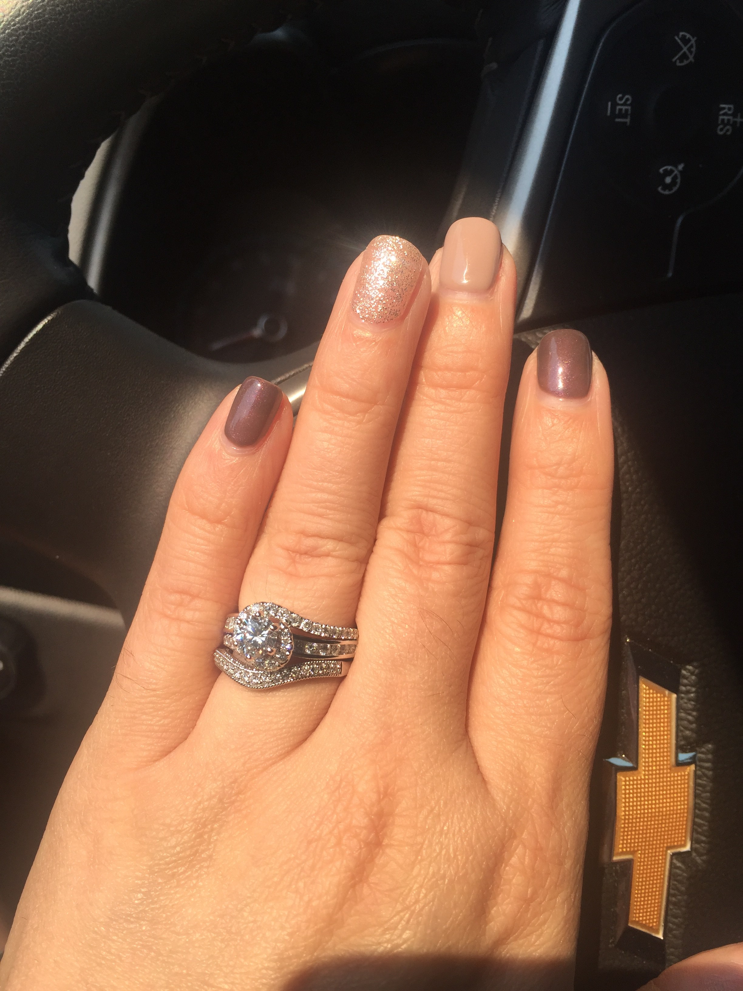 Rings on both hands.