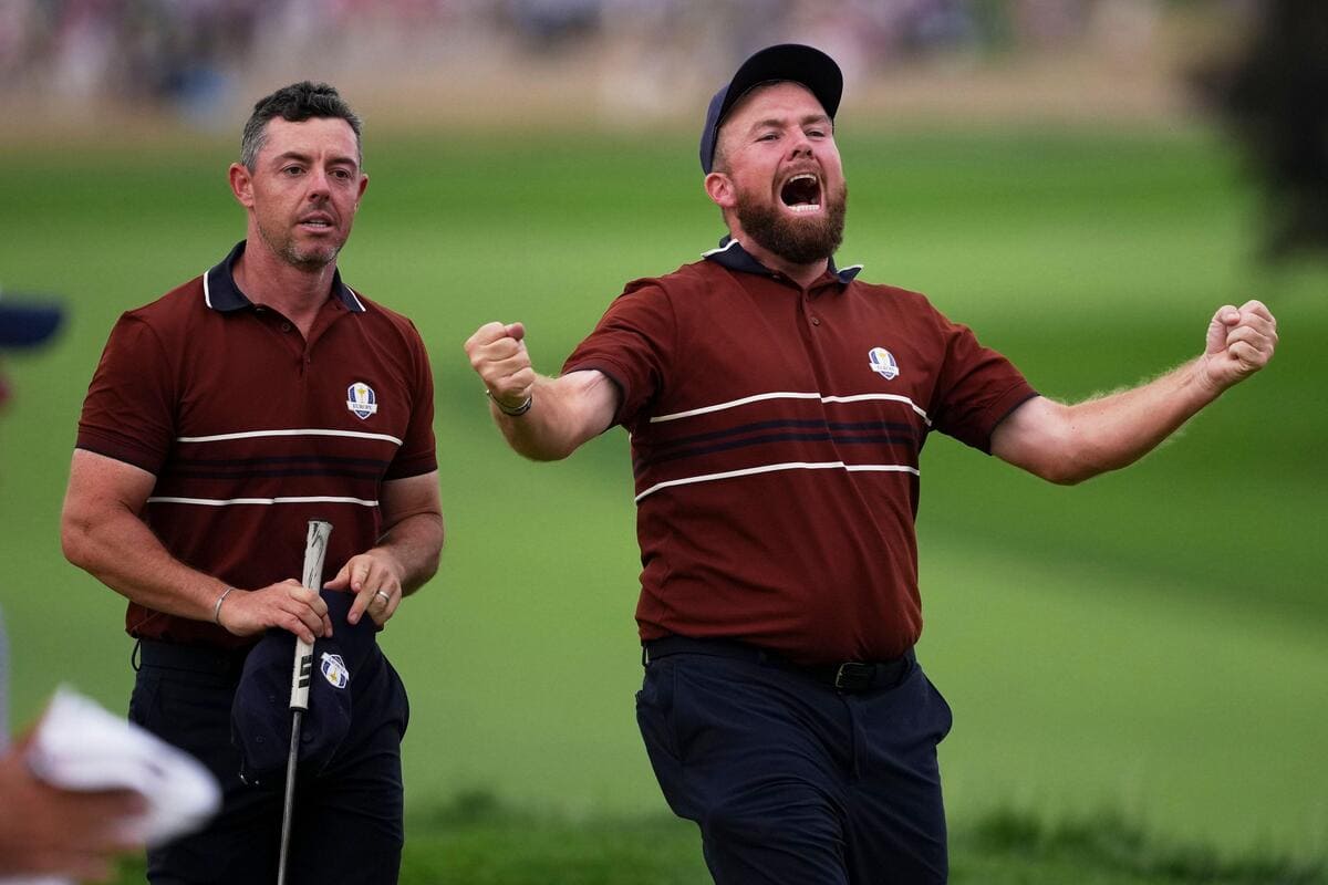 Lowry and McIlroy seal match one victory for dominant Europe after pair heckled by spectators Lowry and McIlroy seal match one victory for dominant Europe after pair heckled by spectators