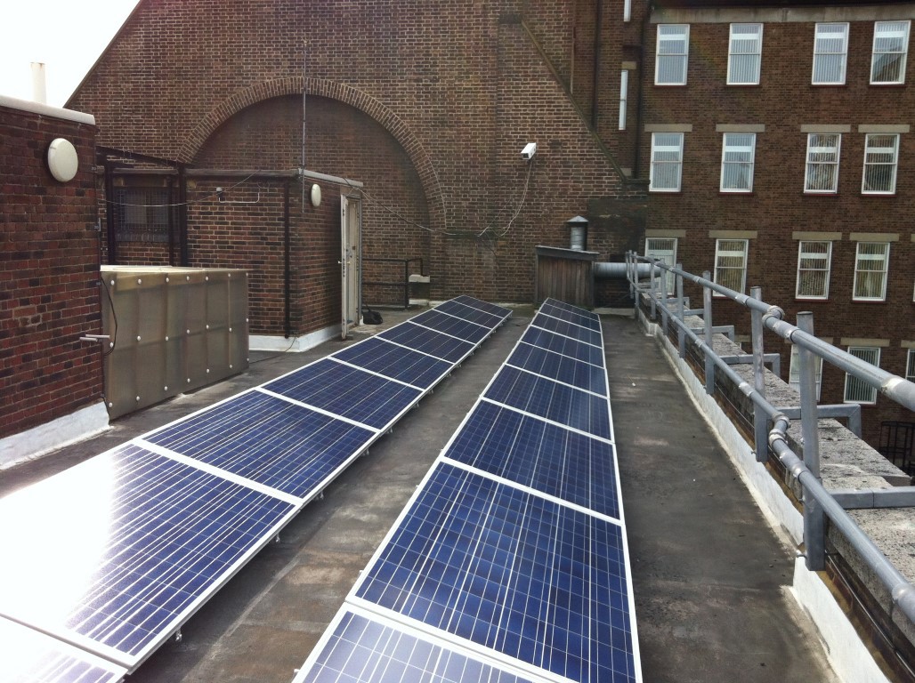 Installation of photovoltaic solar panels at roof level