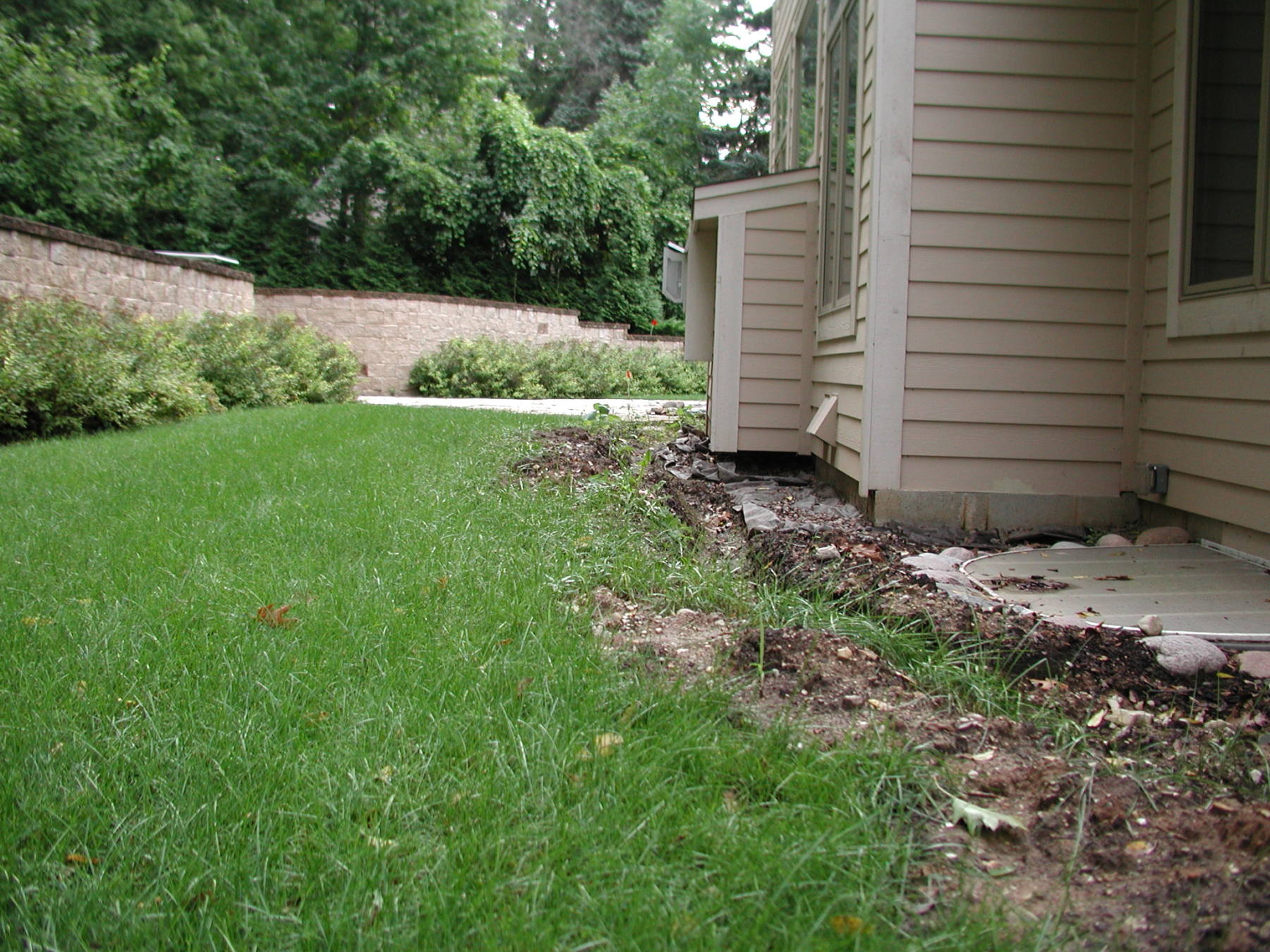 Retaining Wall, Grading, and Patio in Whitefish Bay, WI Integrity