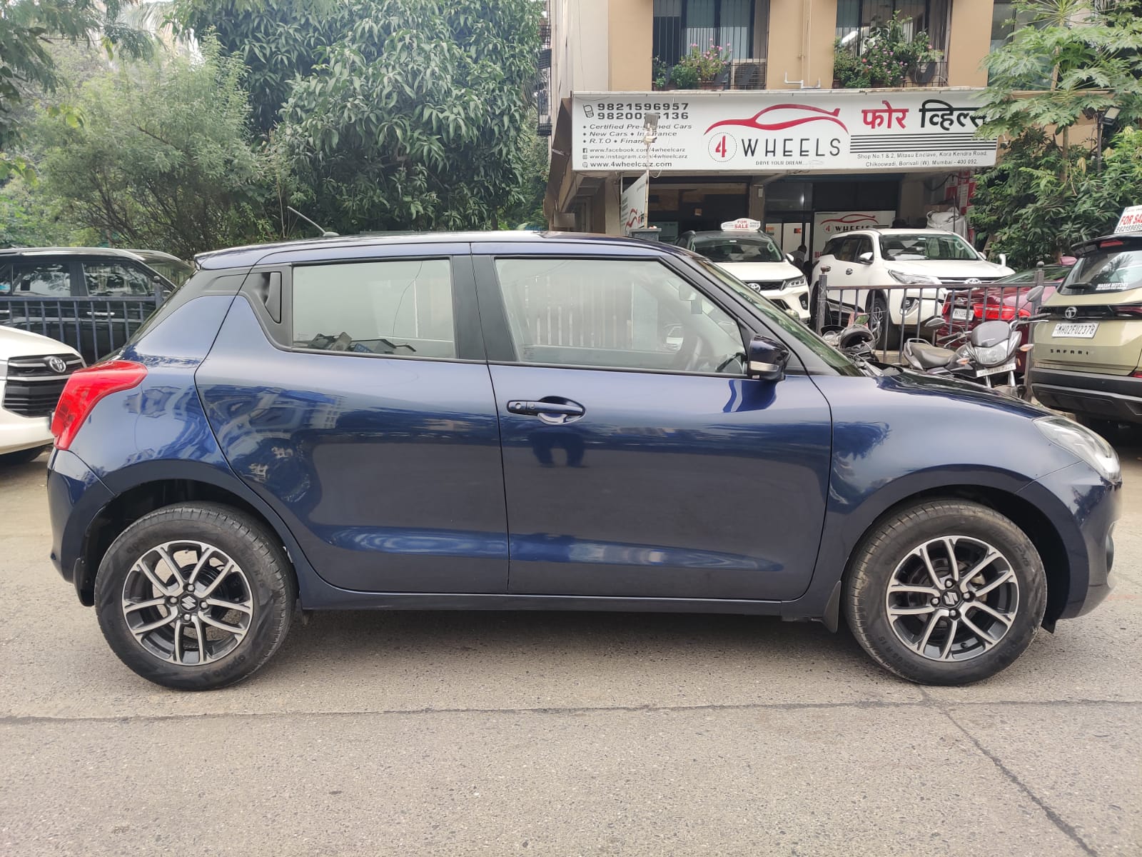 Maruti Swift ZXI + 4 Wheels