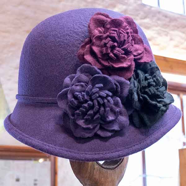 purple felt cloche hat with flowers abbey mill