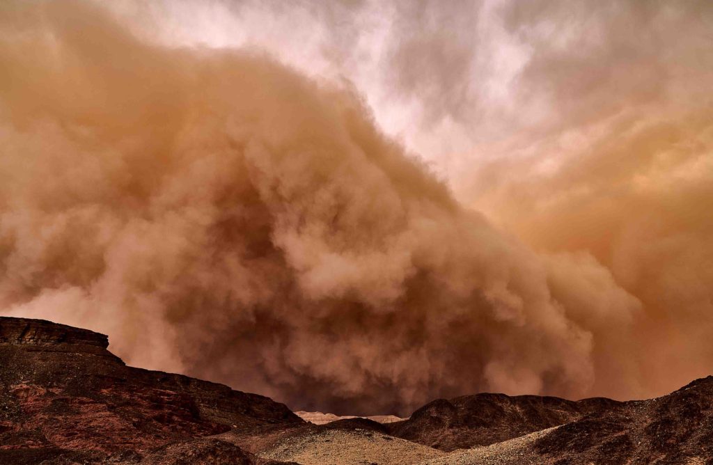 Massive Dust Storms lead to Water Loss of the Red Absolute