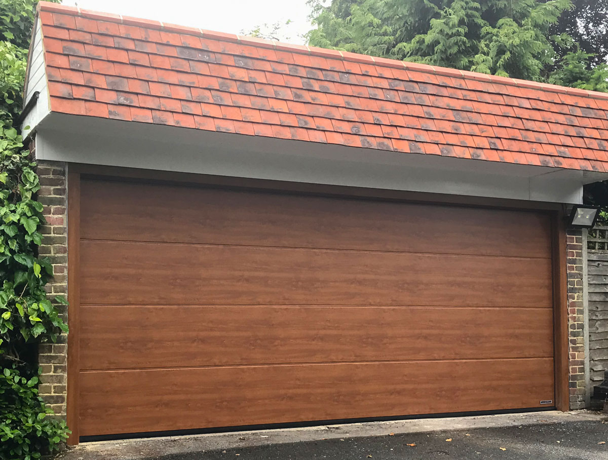 Access Garage Doors Hormann LPU42 L Ribbed Garage Door in Golden Oak